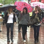 Shoppers in rain