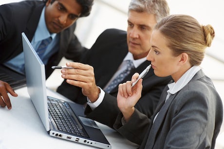 People around a computer