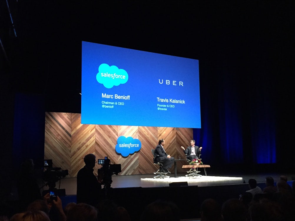 Salesforce CEO Marc Benioff and Uber CEO Travis Kalanick on stage at Dreamforce