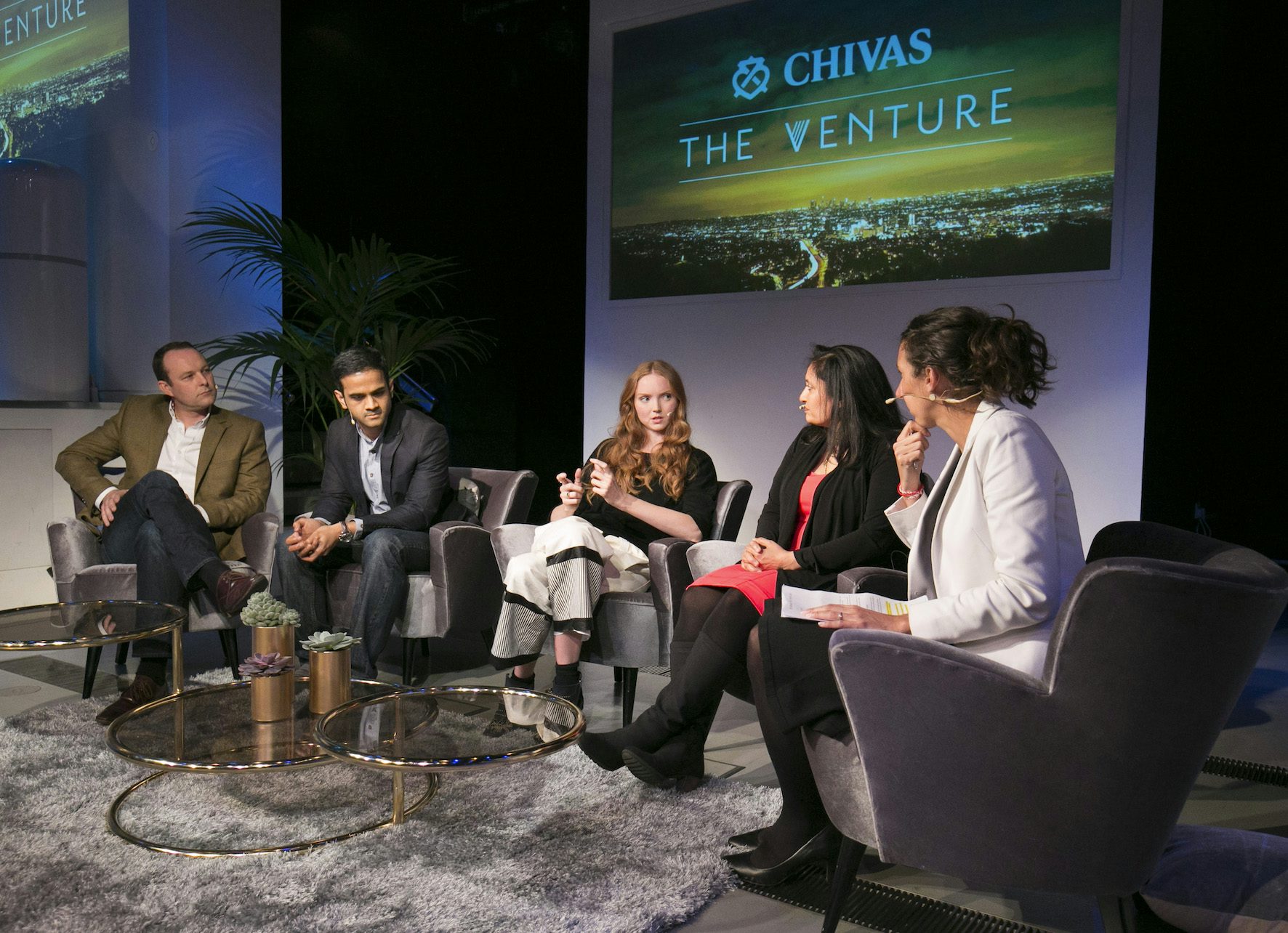 LONDON, ENGLAND - MARCH 17: Thomas Davies, Rajeeb Dey, Lily Cole Sonal Shah and Panel host Daniela Papi-Thorton during a panel discussion on the global impact of social enterprise as part of The Venture – Chivas Regal’s search to find and support the most promising aspiring social entrepreneurs across the world, at Darwin Centre, Natural History Musuem on March 17, 2016 in London, England. (Photo by John Phillips/Getty Images for Chivas) *** Local Caption *** Lily Cole; Rajeeb Dey; Sonal Shah; Thomas Davies; Daniela Papi-Thorton