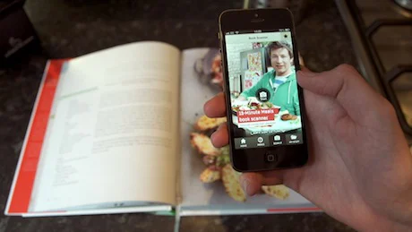 Jamie Oliver adopts augmented reality to enhance traditional cookbook.