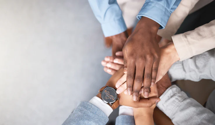 picture of multiple hands on top of each other